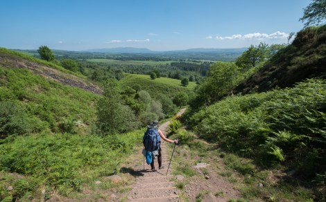 A hiker descending Conic Hill
