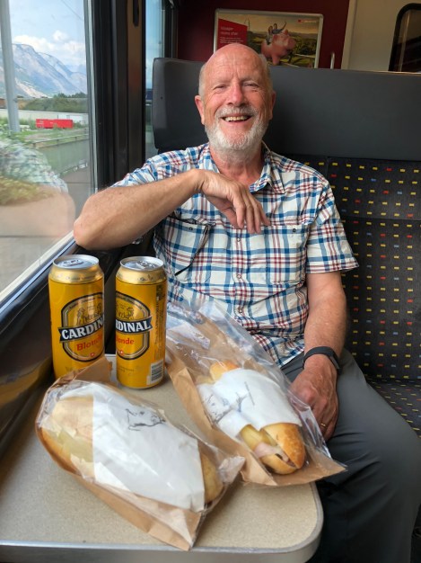 Celebrating on the train with baguettes and beer