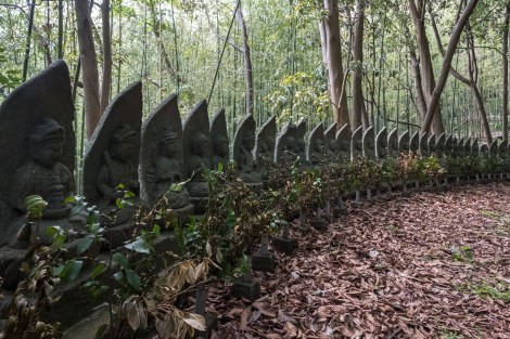 Buddhist statues outside Iwayasan Cave, Sado Island