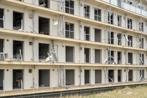Only the top level of this five-story apartment building in Rikuzentakata was unaffected