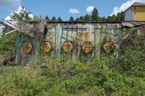Dilapidated buildings along Route 49