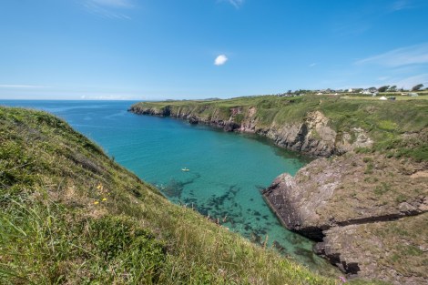 A lone kayak in Caerfai bay