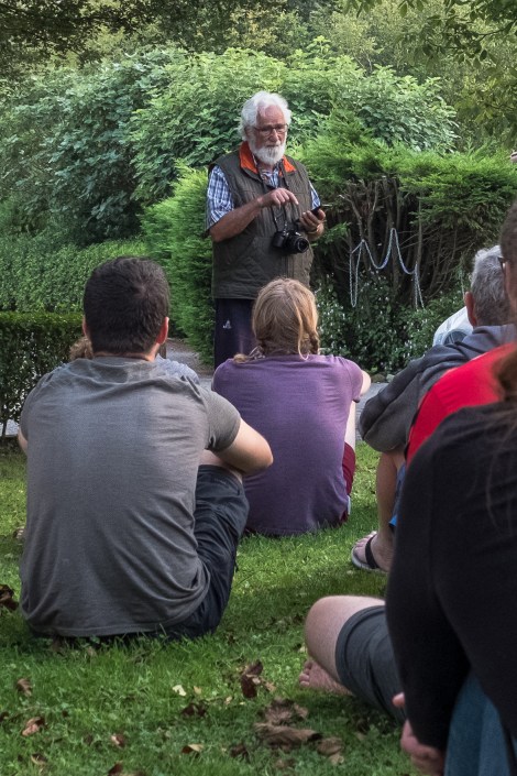 Father Ernesto Bustio welcoming pilgrims in the evening at Albergue La Cabaña del abuelo Peuto in Güemes