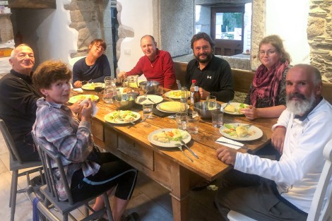Enjoying the communal dinner at Albergue O Xistral in As Paredes-Castromaior