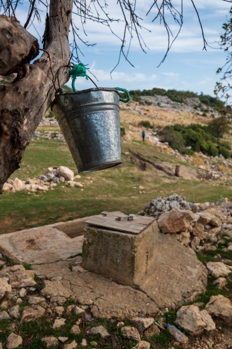 A well with it's own bucket