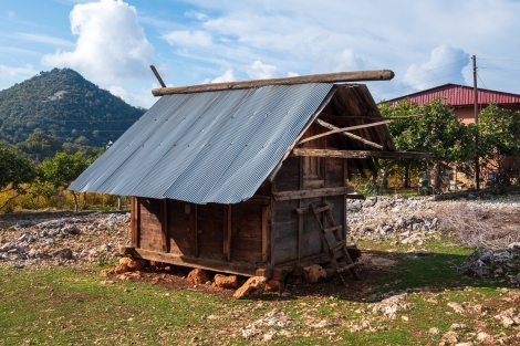 We pass a traditional grain hut in Belören